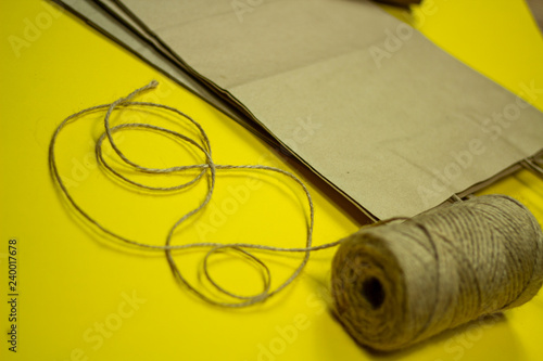 mini stamps and packaging bags for applying the brand on a yellow background