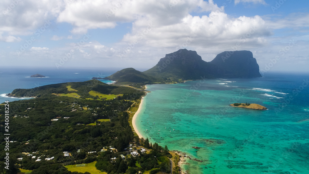 Aerial view of Lord Howe Island (World Heritage-listed paradise), turquoise blue lagoon and Mount Gower on background - New South Wales - Tasman Sea - Australia from above