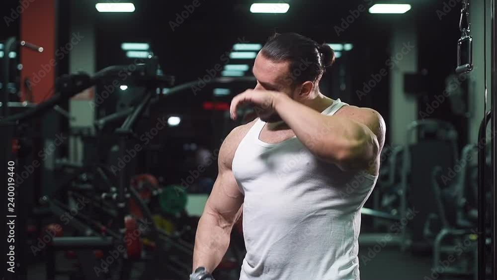 Brutal strong athletic men pumping up muscles workout bodybuilding sport nutrition concept background - muscular bodybuilder handsome men doing exercises in gym naked torso
Brutal strong athletic men pumping up muscles workout bodybuilding sport nutrition concept background - muscular bodybuilder handsome men doing exercises in gym naked torso
