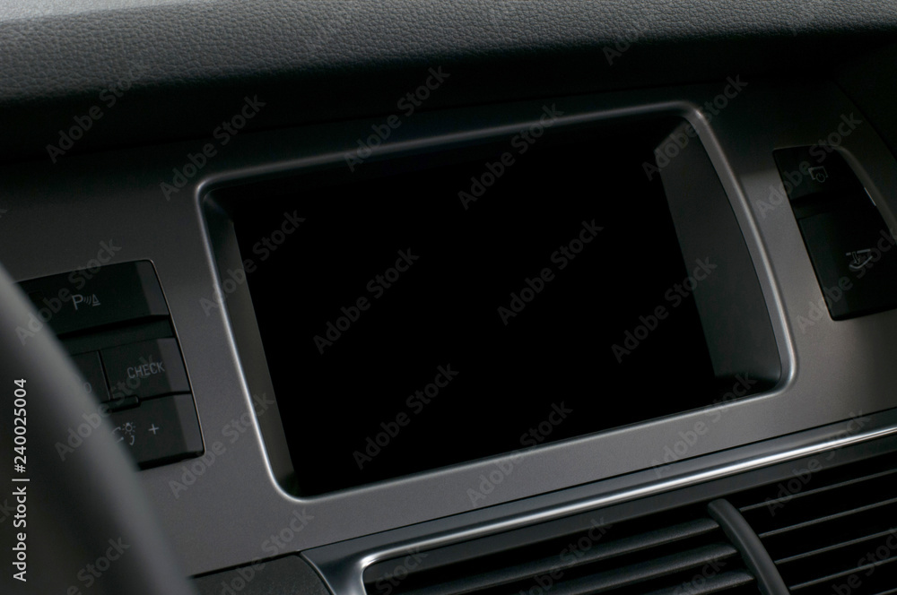 Screen multimedia system in car dashboard. Interior detail. Screen multimedia system in car dashboard. Interior detail.