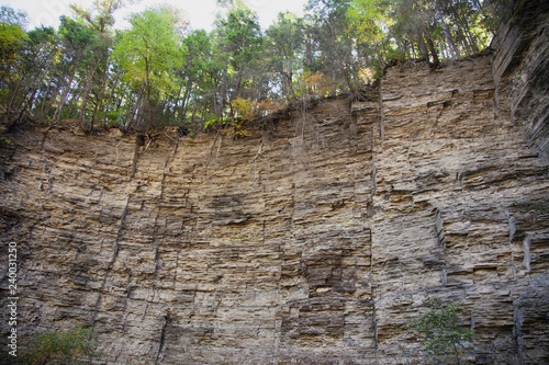 geological limestone cliff formation showing different layers of rocks and geology