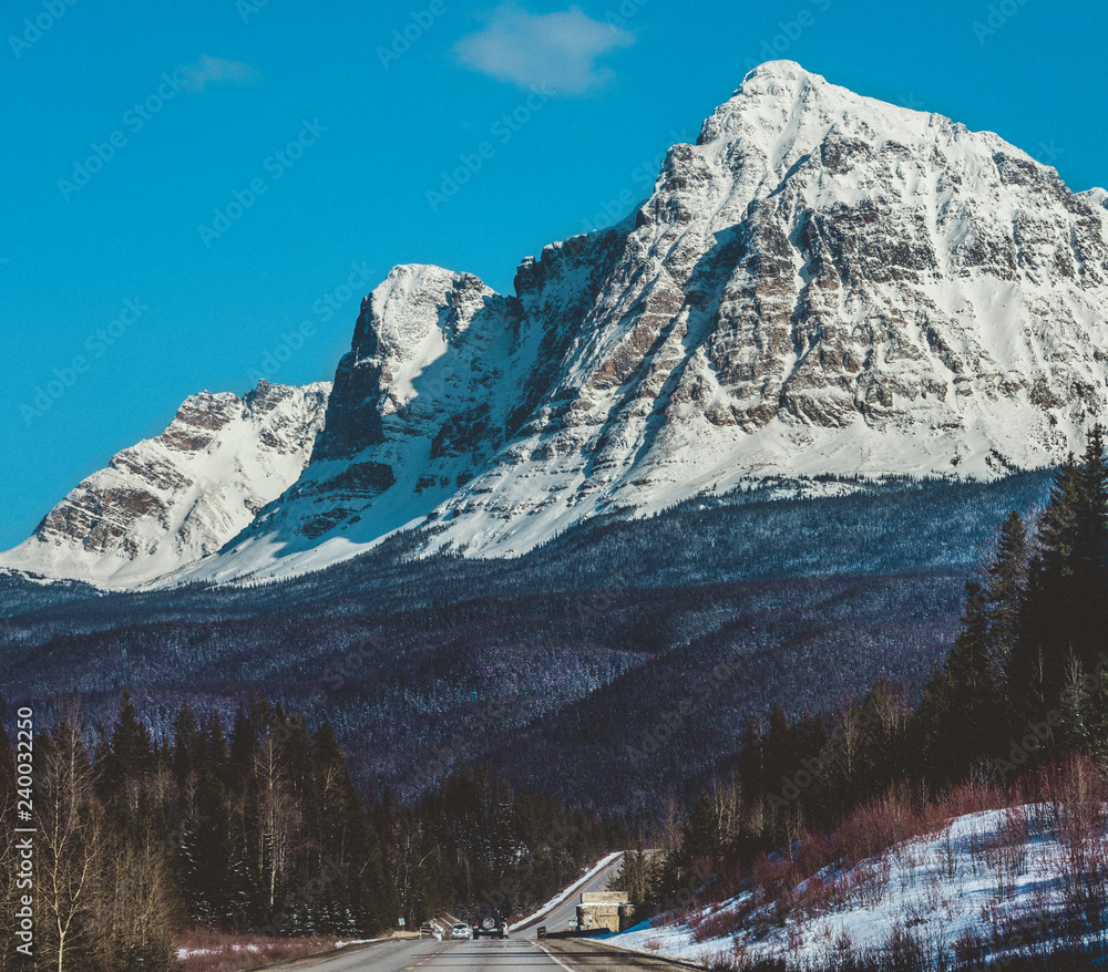 highway through mountains in winter