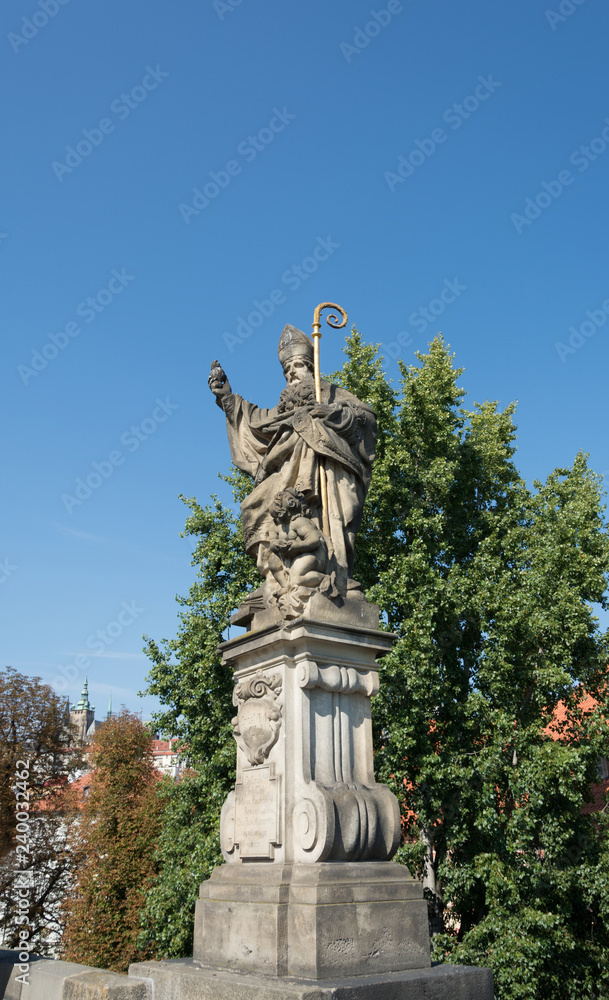 Sculpture at Charles Bridge on Vltava river in Prague, Czech Republic 