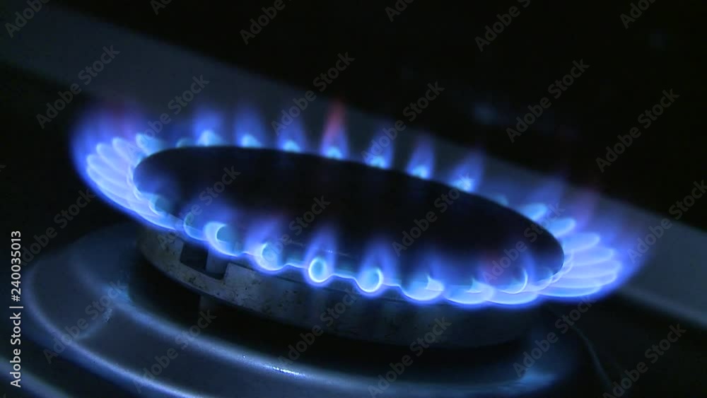 GAS FLAME ON STOVE BEING LIT GAS FLAME ON STOVE BEING LIT