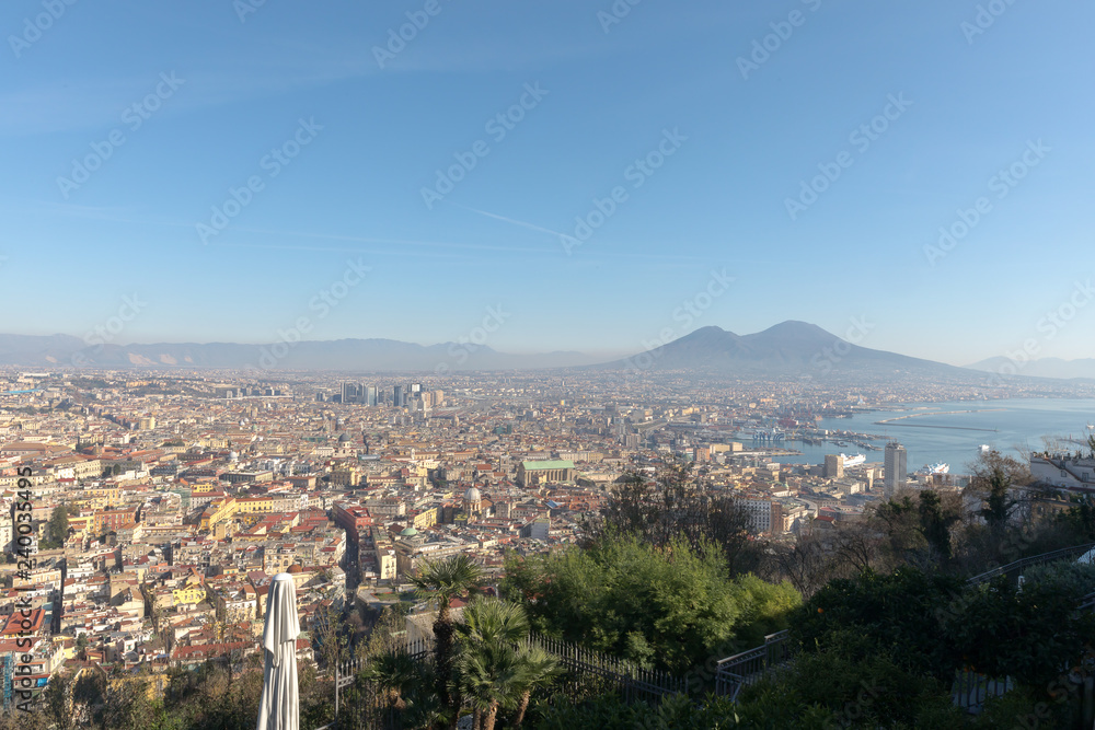 Panoramic view of the city of Naples, and in the background the volcano Vesuvius.