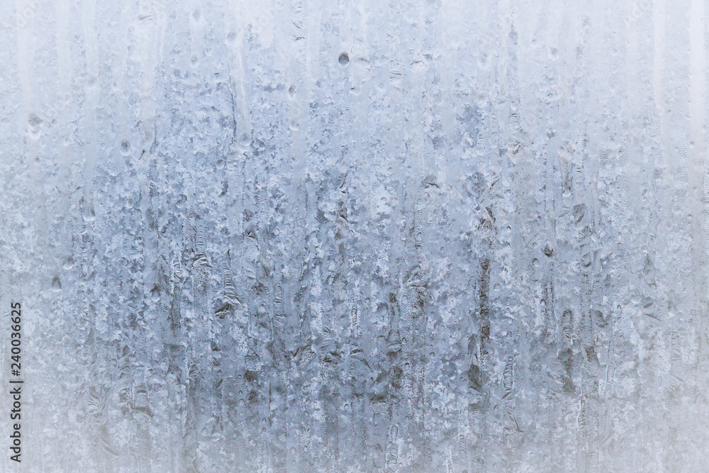 Frosty patterns on a frozen ice box in the early morning Frosty patterns on a frozen ice box in the early morning