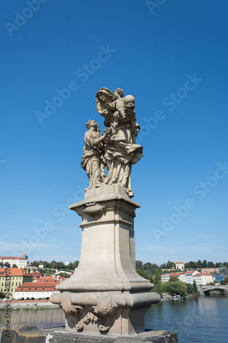Sculpture at Charles Bridge on Vltava river in Prague, Czech Republi © Jelena Z