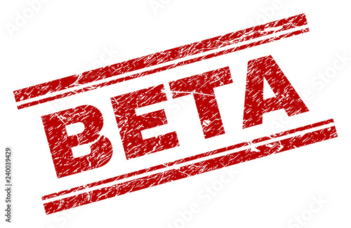 BETA seal stamp with distress texture. Red vector rubber print of BETA text with dust texture. Text tag is placed between double parallel lines.