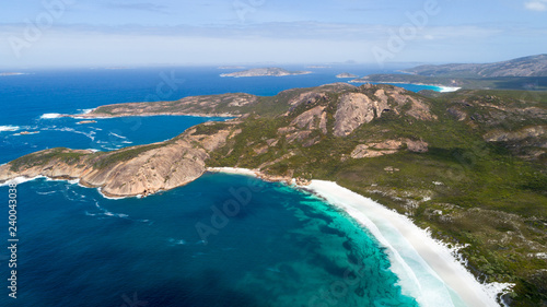 Aerial view of picturesque coastline scenery of Hellfire Bay, colorful cliffs and rocks, white sand beach and crystal clear water - Cape Le Grand, Esperance, Western Australia from above