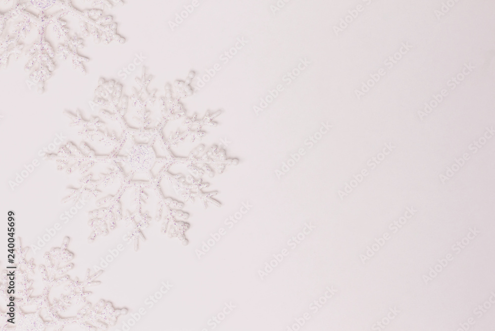 Three shiny white snowflakes on pure white background. Copy paste. Three shiny white snowflakes on pure white background. Copy paste.