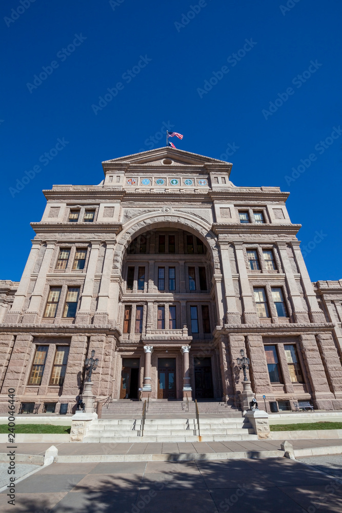 Austin, Texas state capitol building with blue sky.