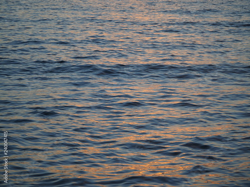 water surface of the atlantic ocean at sunset
