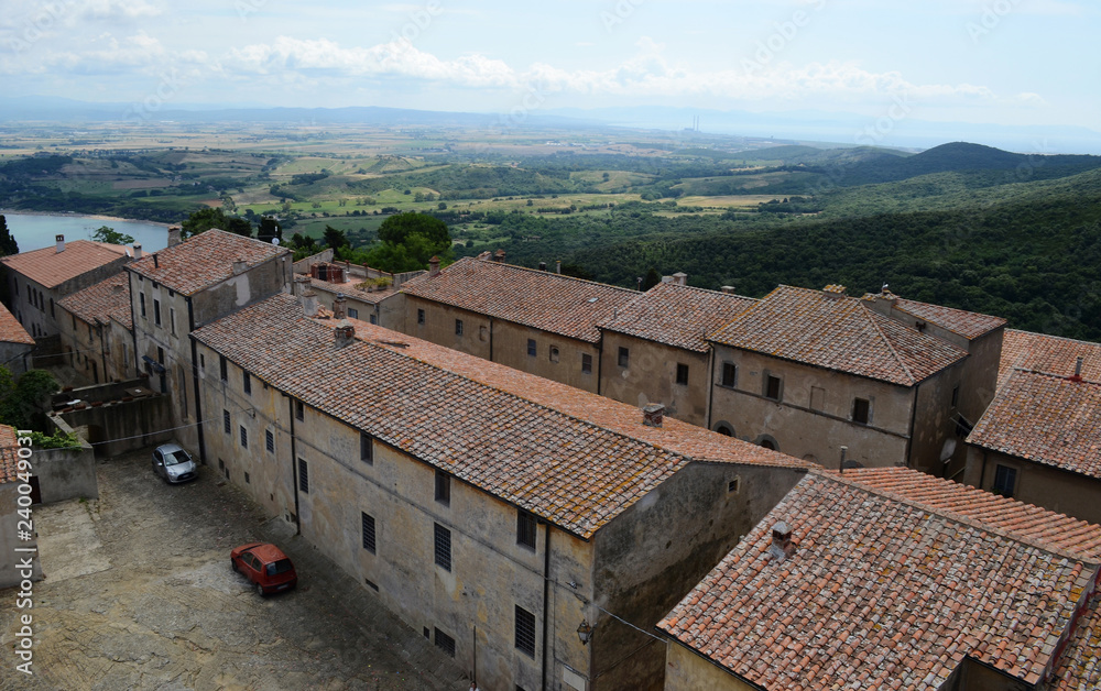 Tuscany, Italy. landscape of Populonia buildings in the top of a hill, and the sorrounding country