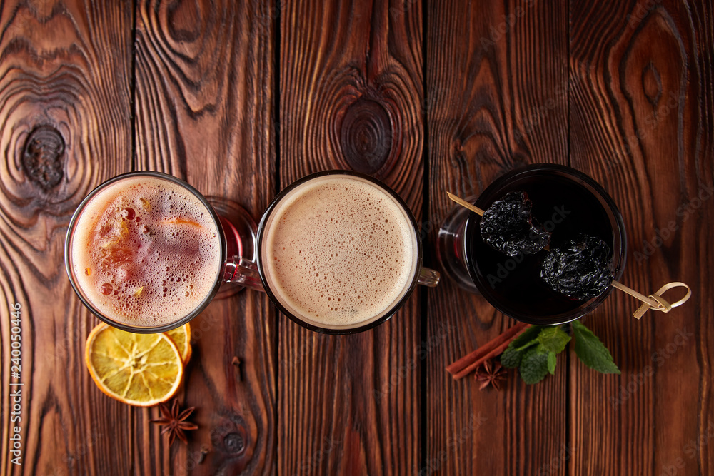 Three glasses with hot alcoholic drinks Three glasses with hot alcoholic drinks