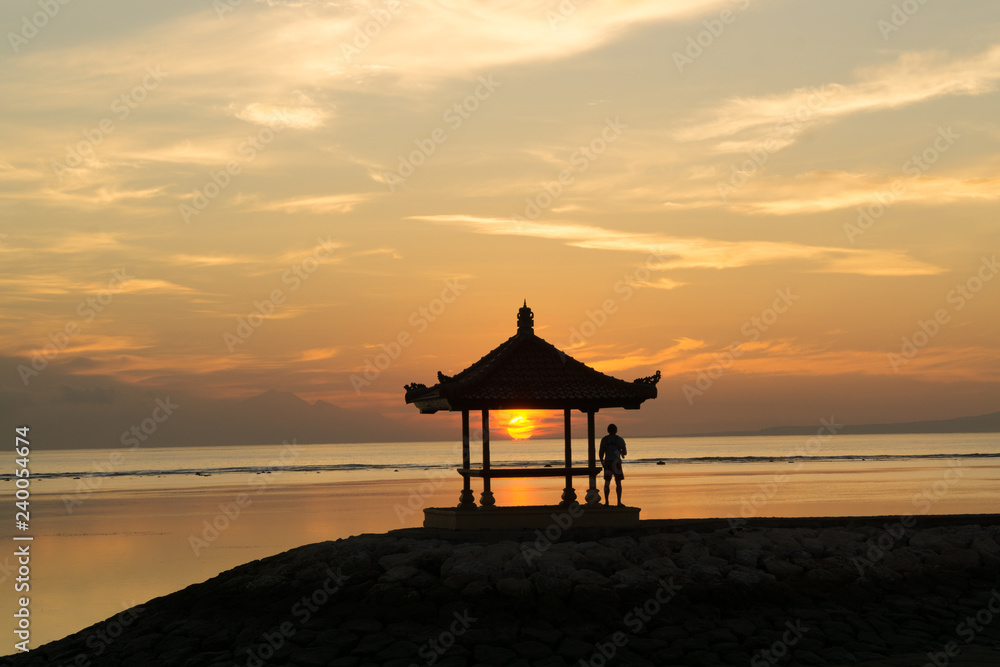 Silhouette of a small pavilion during sunrise Silhouette of a small pavilion during sunrise