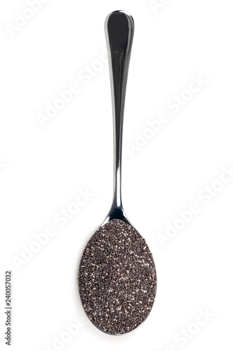 chia seeds in an iron spoon, isolated