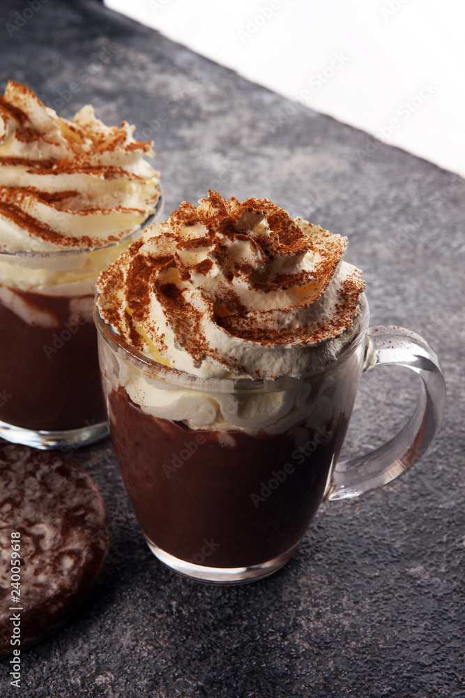 Hot chocolate cocoa with whipped cream for xmas on table Hot chocolate cocoa with whipped cream for xmas on table