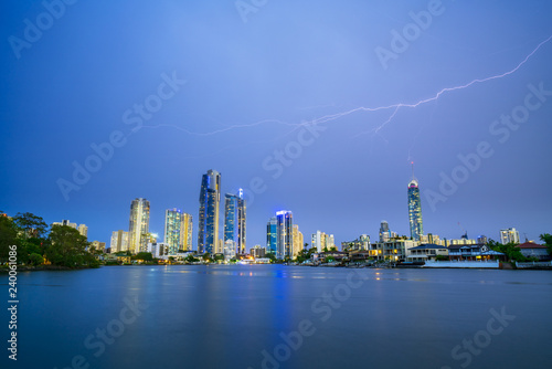 The Gold Coast Arts Centre with a view of Surfers Paradise at sunset with amazing sky and reflections photo