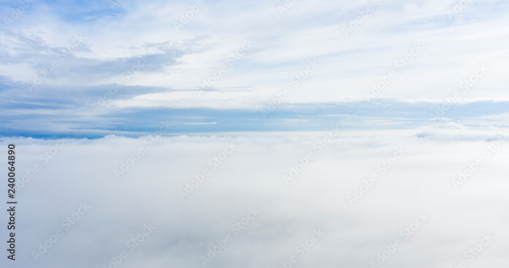 Obraz premium Aerial view of some beautiful clouds and a blue sky.