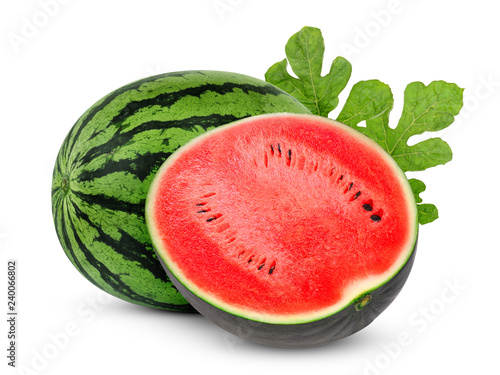 whole and half watermelon with green leaves isolated on white background