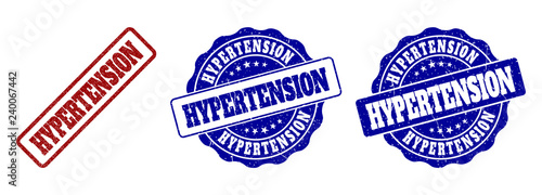 HYPERTENSION grunge stamp seals in red and blue colors. Vector HYPERTENSION watermarks with grunge texture. Graphic elements are rounded rectangles, rosettes, circles and text captions.