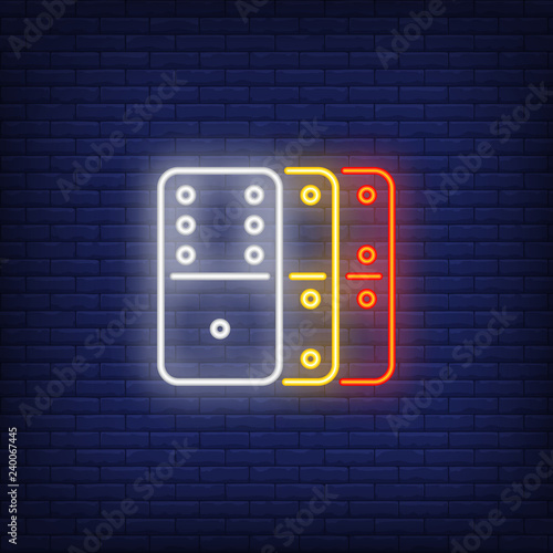 Three bright dominoes tiles neon sign. Board game and recreation design element. Night bright neon sign, colorful billboard, light banner. Vector illustration in neon style.