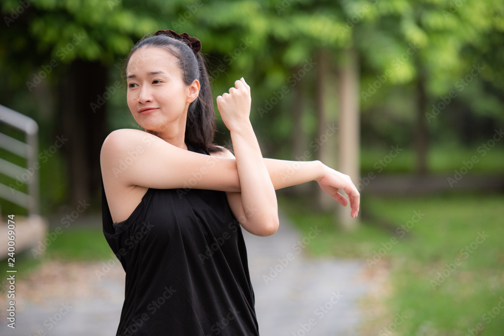 beautiful Asian girls Warm Up in the park,Healthy Concept beautiful Asian girls Warm Up in the park,Healthy Concept
