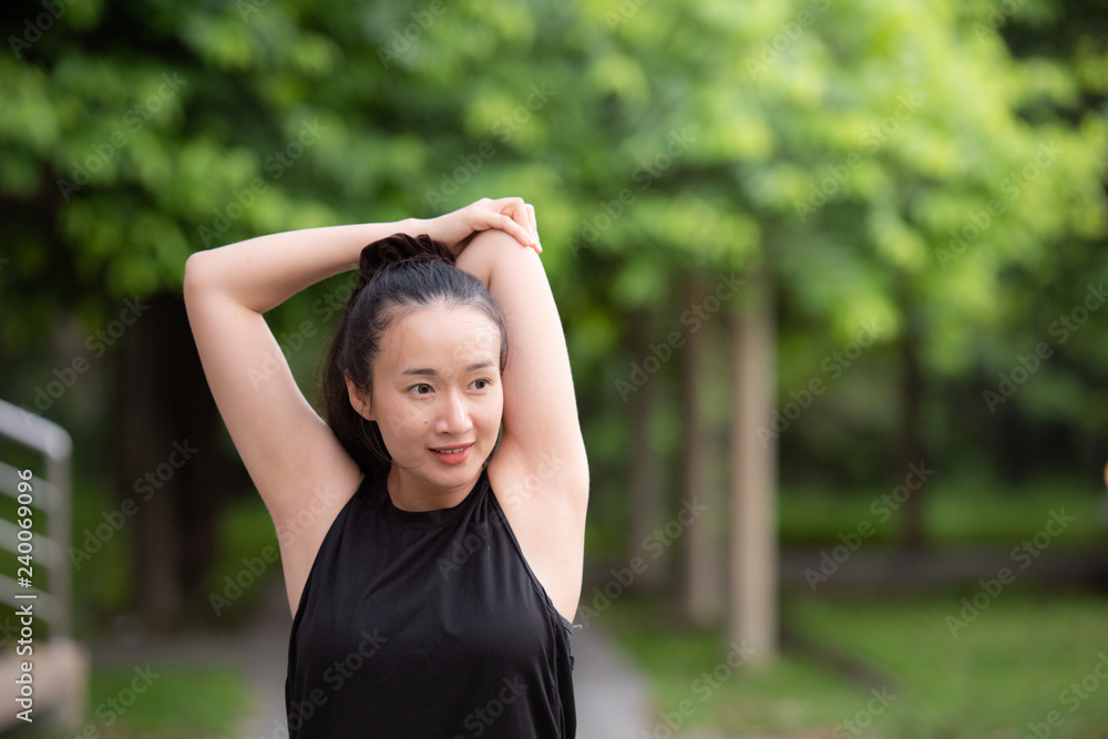 beautiful Asian girls Warm Up in the park,Healthy Concept beautiful Asian girls Warm Up in the park,Healthy Concept