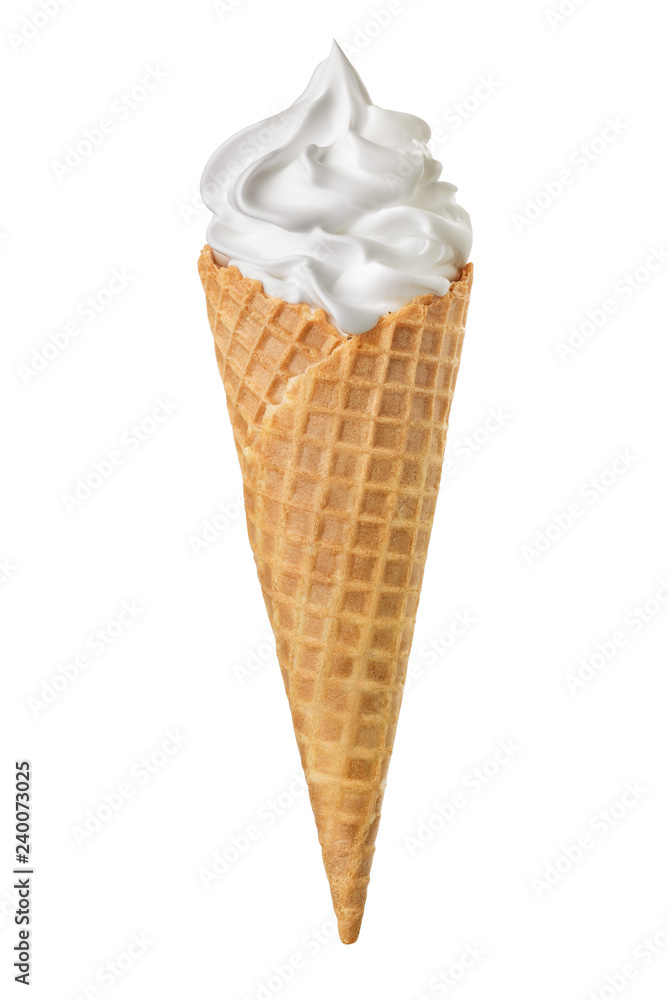 Soft ice cream in wafer cone isolated Soft ice cream in wafer cone isolated