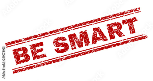 BE SMART seal imprint with distress texture. Red vector rubber print of BE SMART text with unclean texture. Text title is placed between double parallel lines.