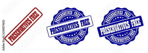 PRESERVATIVES FREE grunge stamp seals in red and blue colors. Vector PRESERVATIVES FREE labels with grainy style. Graphic elements are rounded rectangles, rosettes, circles and text labels.