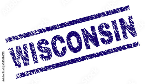 WISCONSIN seal print with distress style. Blue vector rubber print of WISCONSIN caption with unclean texture. Text caption is placed between parallel lines.