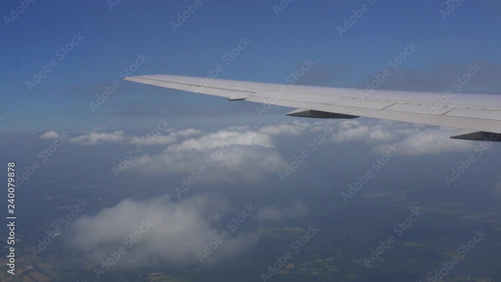 Traveling by air. View through an airplane jet side window sky clouds airplane flight Traveling by air. View through an airplane jet side window sky clouds airplane flight