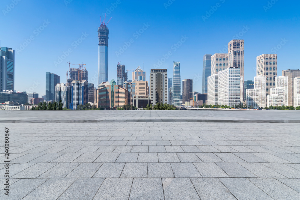 Panoramic skyline and modern business office buildings with empty road,empty concrete square floor