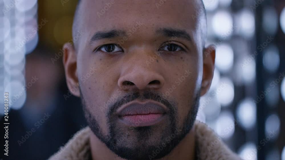 Portrait of handsome black male looking to camera Portrait of handsome black male looking to camera