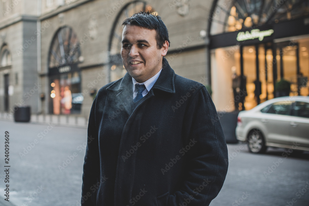 Man in city, businessman at downtown. Worker man outdoor. Lifestyle concept plump people Man in city, businessman at downtown. Worker man outdoor. Lifestyle concept plump people