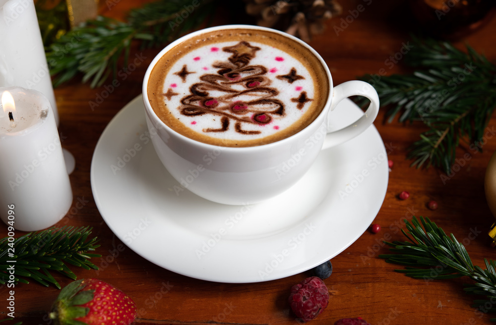 Cute cup of coffee, cafe late art Christmas tree and festive decoration Cute cup of coffee, cafe late art Christmas tree and festive decoration
