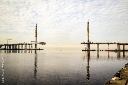 Unfinished bridge over the bay in the north.