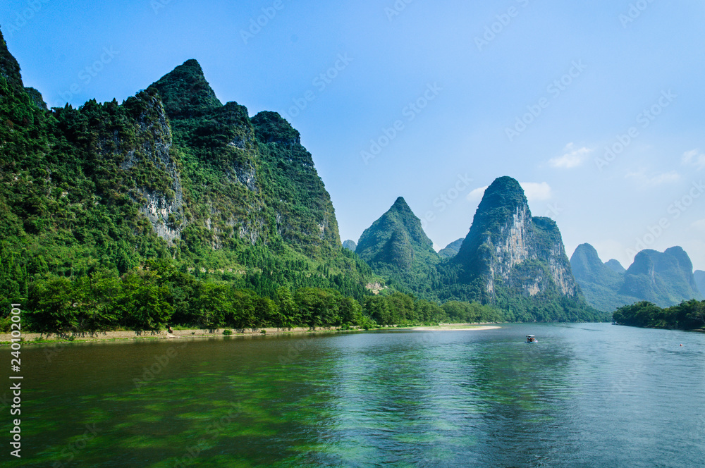 Mountains and river scenery with blue sky Mountains and river scenery with blue sky