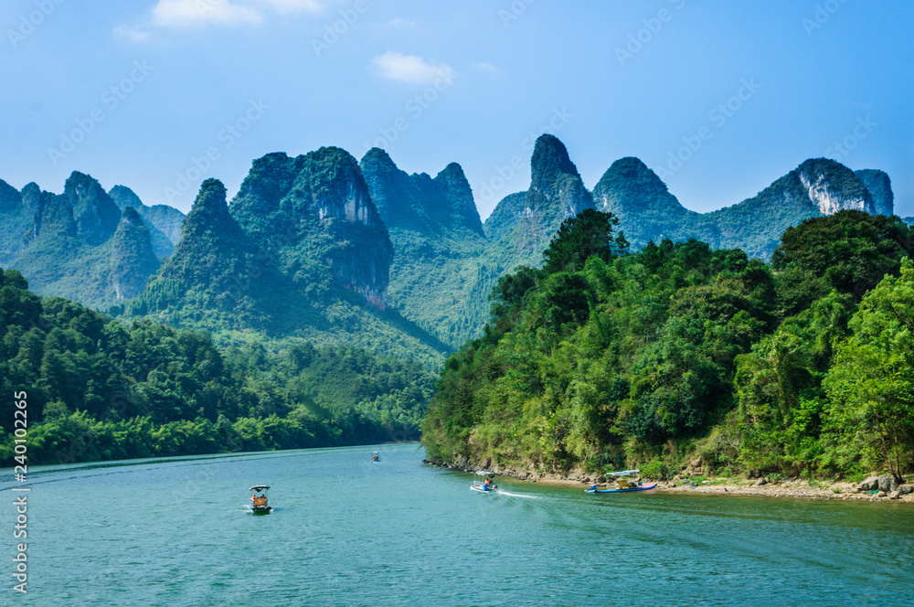 Beautiful mountains and river scenery with blue sky, Yangshuo, China. Beautiful mountains and river scenery with blue sky, Yangshuo, China.