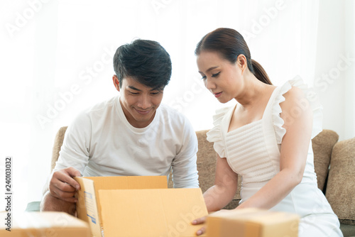 Young couple working with their small business