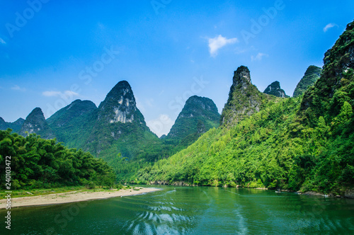 Mountains and river scenery with blue sky  © carl