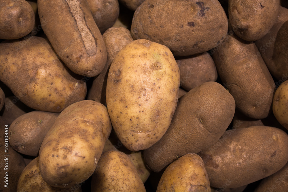 pile of potatoes at supermarket pile of potatoes at supermarket