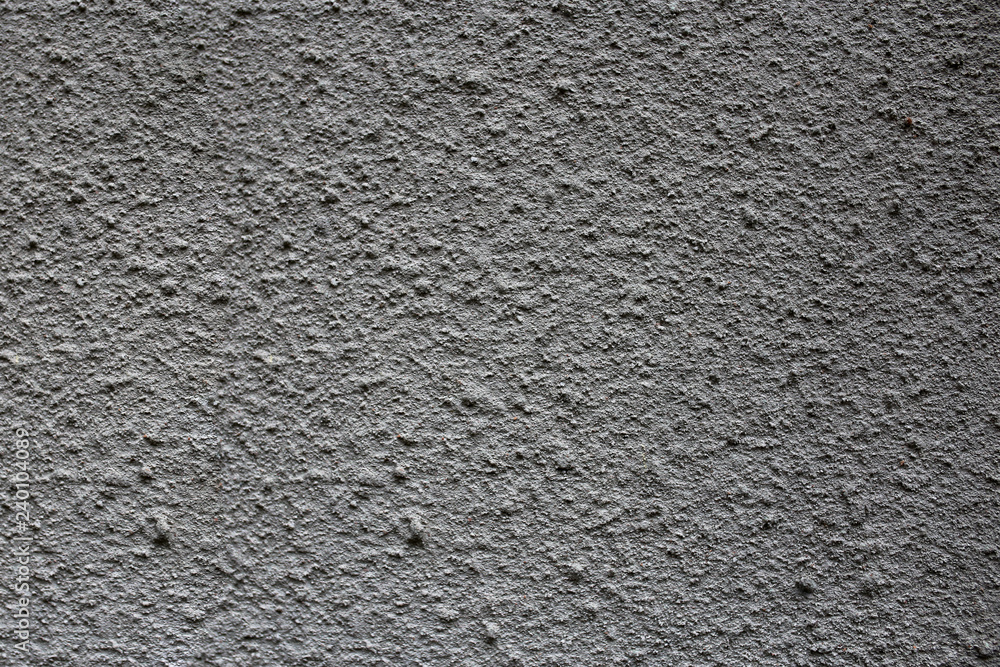 rough grey texture of the wall. small pimples rough grey texture of the wall. small pimples