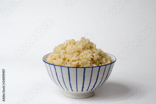 Cooked brown rice in a Japanese style bowl