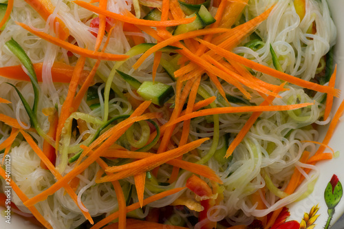 Funchoza salad with carrot, cucumber and pepper