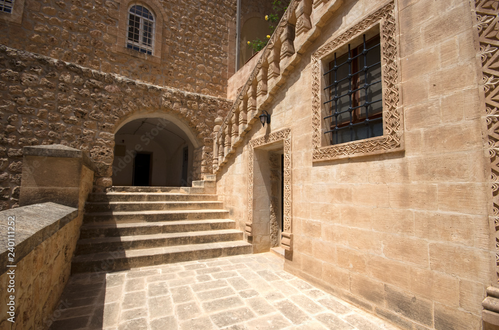 Mardin, Midyat / Turkey - May 17 / 2015: Courtyard details of Mor Gabriel (Deyrulumur) monastery