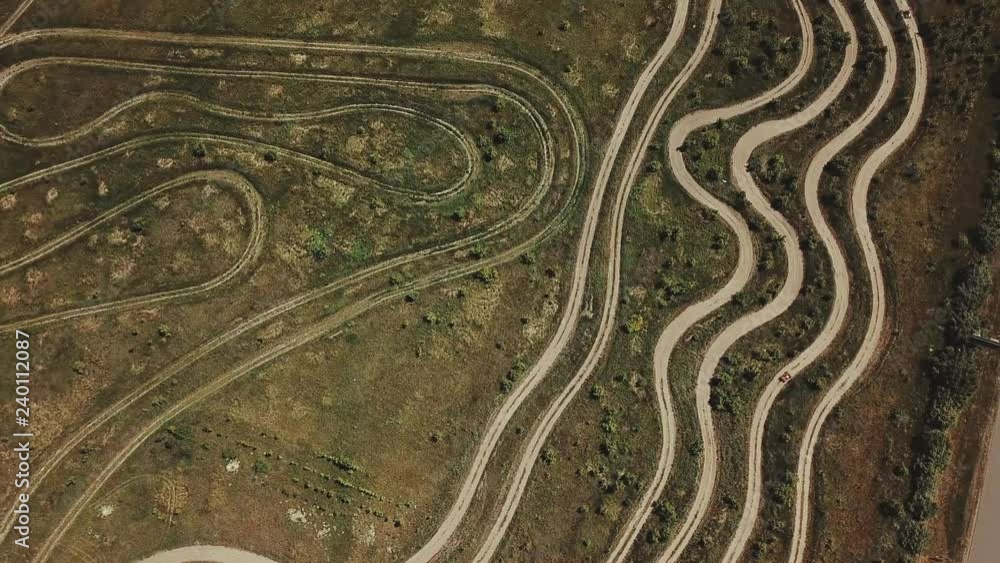 Aerial view of an Off-road car riding on countryside road,Buggy, Aerial view of an Off-road car riding on countryside road,Buggy,