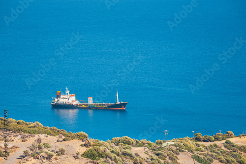 Fototapeta Naklejka Na Ścianę i Meble -   a major oil storage and terminal facility, located on the small island of Aghios Pavlos, Saint Paul, Crete, Greece