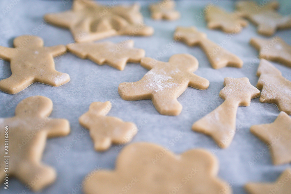 Baking cookies for Christmas. Cookies on baking sheet. Selective focus.